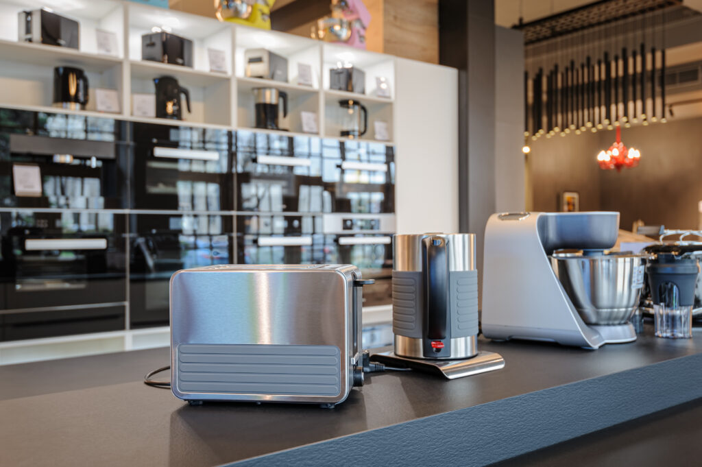 A retail store homeroom display featuring a variety of kitchen appliances.